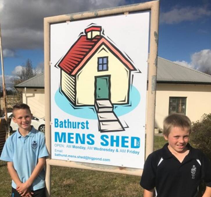 A LOOK INSIDE: Students in Years 5 and 6 from Perthville Public School were lucky to get a glimpse of the hard work carried out at Bathurst Men's Shed. Photo supplied.