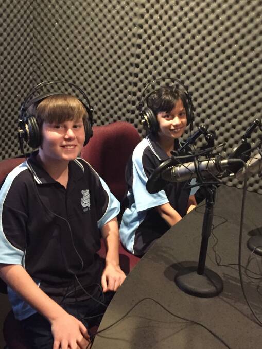 ON AIR: Schools captains, Jacobi and Karli let the audience of 2BS know about their school's activities during Education Week. Photo supplied. 