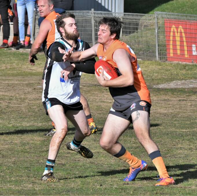 GOING STRONG: Greg Reid backed up from his men's tier two match to play in the Giants' tier one win over the Bushrangers. He's now played 50 senior games for the Giants. Photo: CHRIS SEABROOK