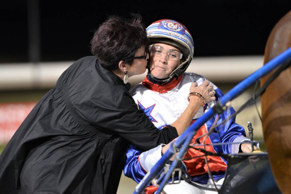 WELL DONE: Jenny Turnbull congratulates her daughter Amanda Turnbull after her winning drive aboard Ellmers Image in the Smooth Satin Cup. Photo: ANYA WHITELAW