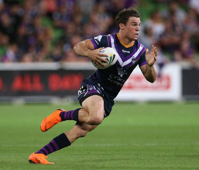 EMBRACING THE CHALLENGE: Melbourne Storm playmaker Brodie Croft is looking forward to battling Penrith's halves at Carrington Park on Saturday night. Photo: AAP