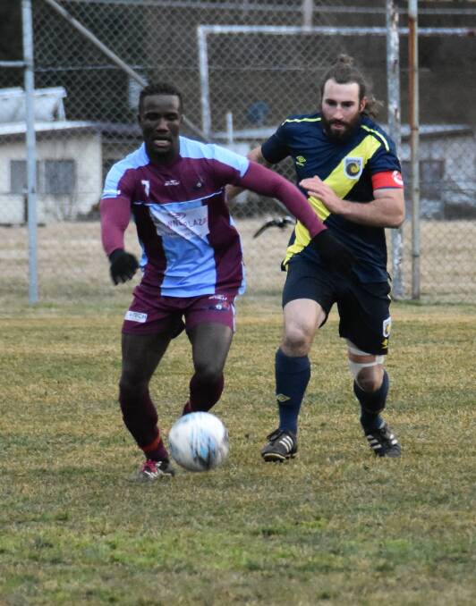 TOP EFFORT: Mariners skipper Nikki Spice (left) pictured in his side's contest against Hawkesbury earlier this season, was proud they came to close to beating competition leaders St George on Saturday. Photo: CIARA BASTOW