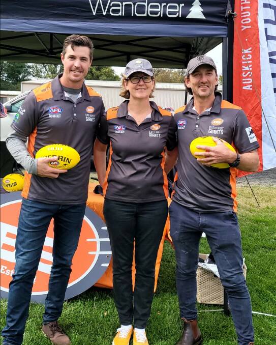 COUP: Former St Kilda star Lenny Hayes, pictured with Giants president Kath Sloan and James Leslie, will play for the Bathurst club this season. Photo: CONTRIBUTED