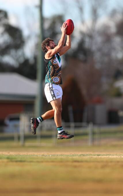 GOT IT: Bathurst Bushrangers Outlaws co-coach Ben Horn was delighted that he and his team-mates clinched a spot in the Central West AFL finals series. Photo: PHIL BLATCH