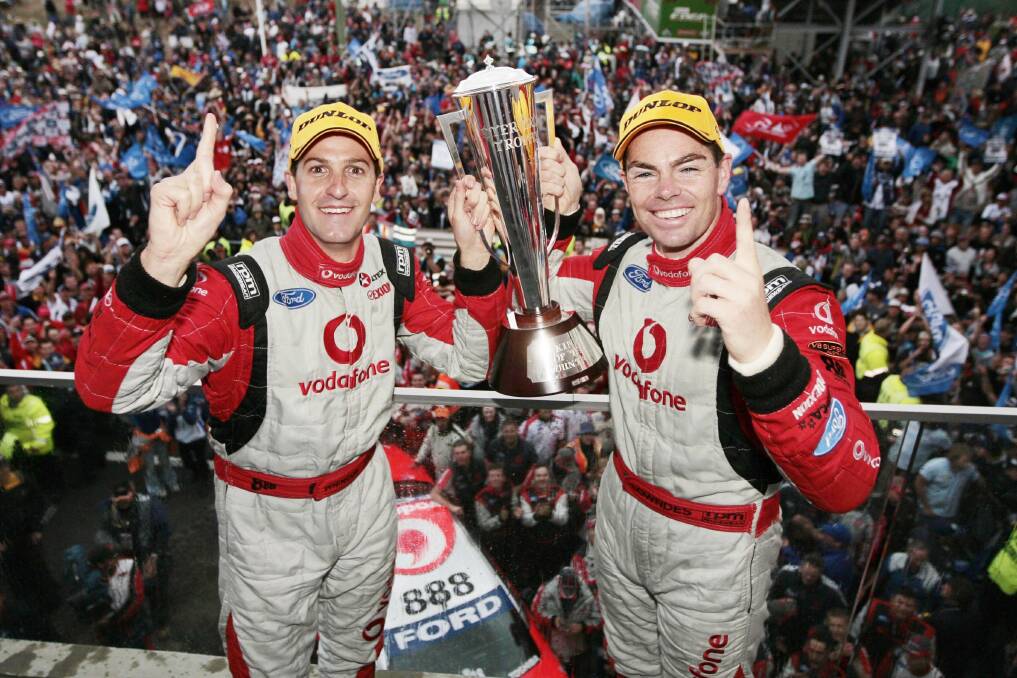 REUNION: Jamie Whincup and Craig Lowndes hold the Peter Brock Trophy after winning the 2007 Bathurst 1000. This year the pair will again share a seat.