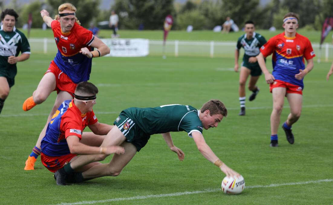ANOTHER CRACK: Bathurst league talent Tyler Colley scores in last year's Andrew Johns Cup decider. This Saturday he will play for Daley Cup glory. 