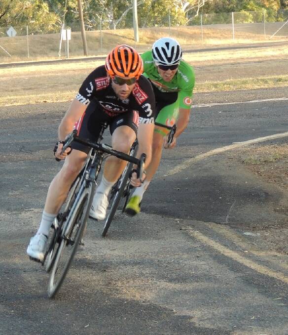 IN FORM: Craig Hutton leads Will Hodges in the Summer Series Criterium. Both will contest the division one men's Bathurst Criterium this Saturday. Photo: CONTRIBUTED