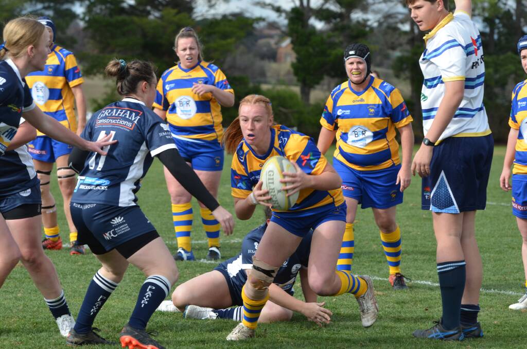 ON THE PROWL: Bathurst Bulldogs scrumhalf Annie Craig steps her way through Forbes' defence in Saturday's Ferguson Cup clash. Photo: ANYA WHITELAW