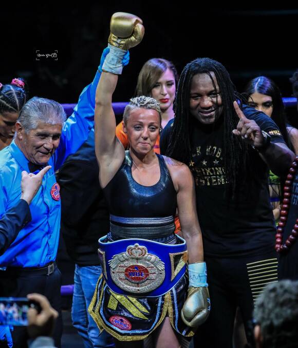 TRIUMPH: Bathurst native Kylie Fulmer is declared the winner of the World Boxing Federation Women’s Intercontinental Super Bantamweight world title. Photo: KYLIE FULMER/ROSITA GTZ