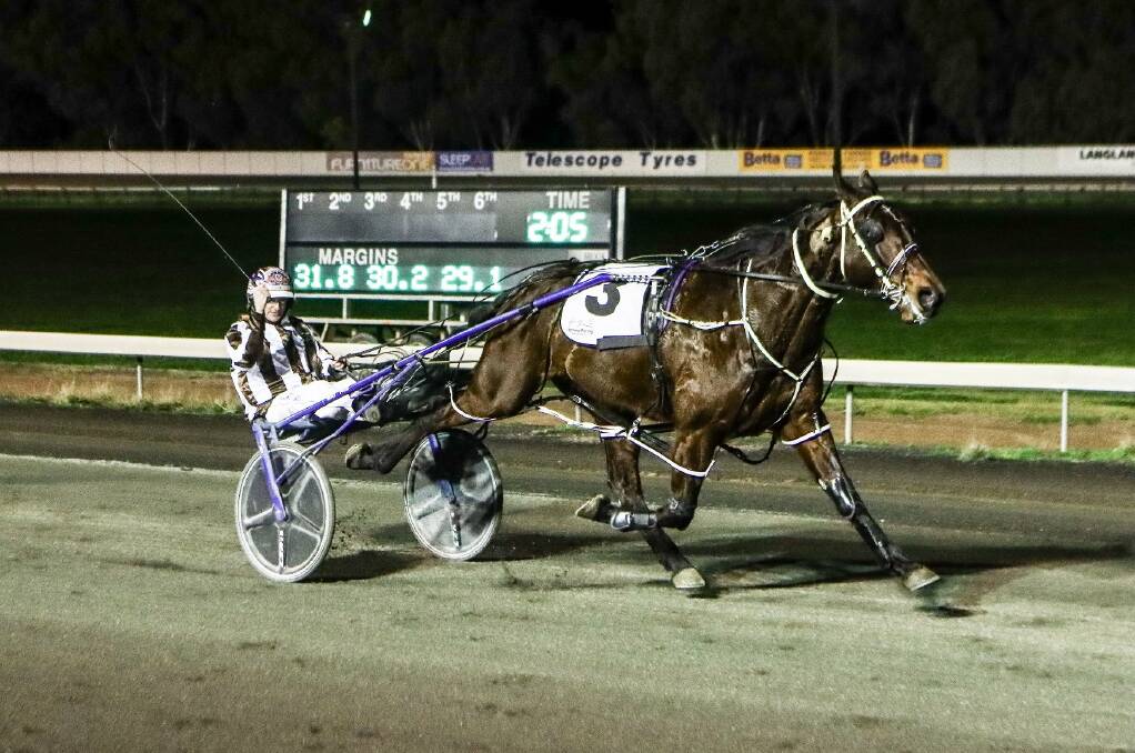 LEGENDARY MOMENT: Mat Rue wins with Art Legend to take his career tally of victorious drives to 1,000. Photo: COFFEE PHOTOGRAPHY AND FRAMING