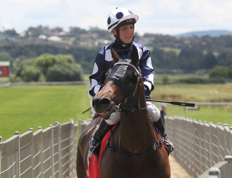 SADDLE UP: Eleanor Webster-Hawes has the ride aboard the Ryans' mare Ave at Kensington on Friday. Photo: PHIL BLATCH