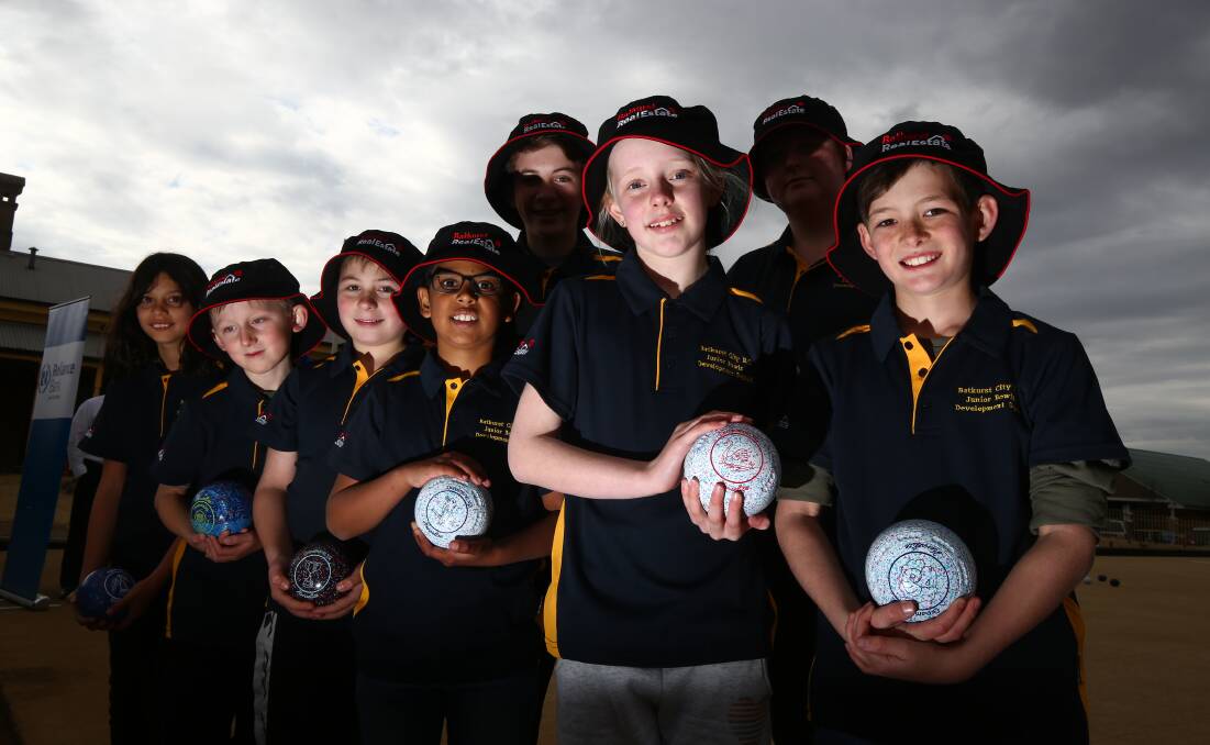 NEW FACES: Members of the new Bathurst City Junior Lawn Bowls Development Squad with club president Ross James. Photo: PHIL BLATCH 072818pbbowls1