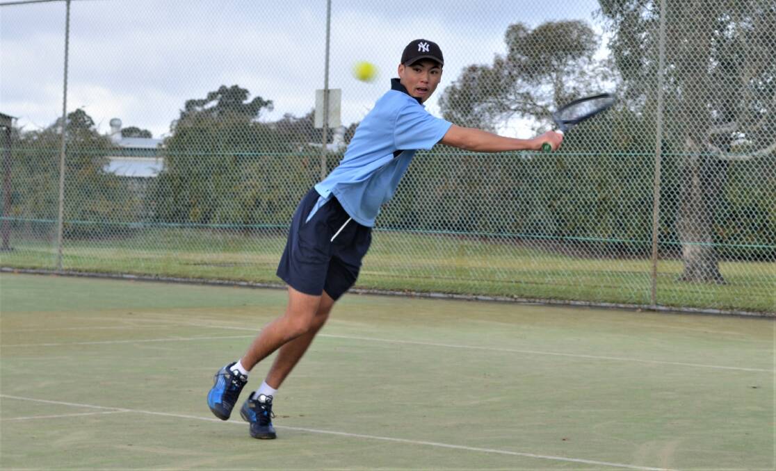 GOOD TOUCH: Jeorge Collins stretches to make a backhand volley during the Pizzey Cup trials.