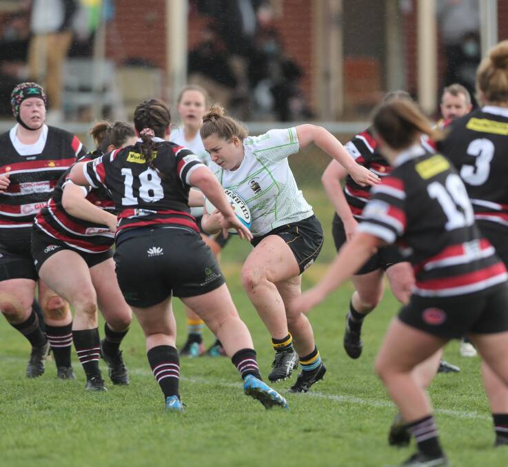 TIME TO CHARGE: CSU must beat Mudgee on Saturday to keep its title defence alive. Photo: PHIL BLATCH