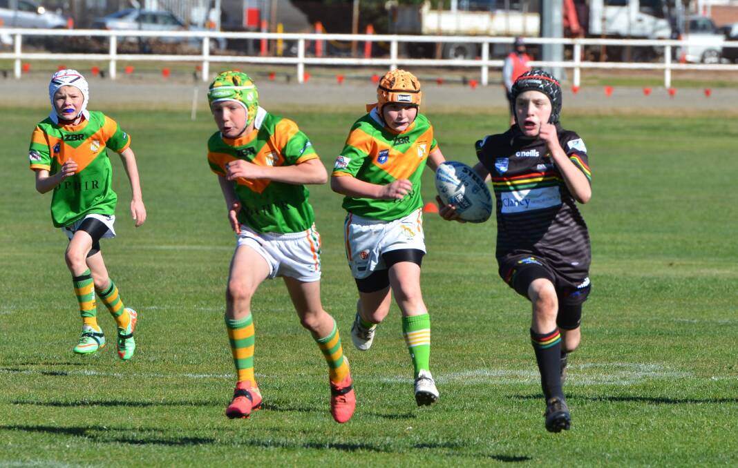 MAX POWER: Max Higgins made good yards from his kick returns for the under 11 Bathurst Panthers. Photo: ANYA WHITELAW