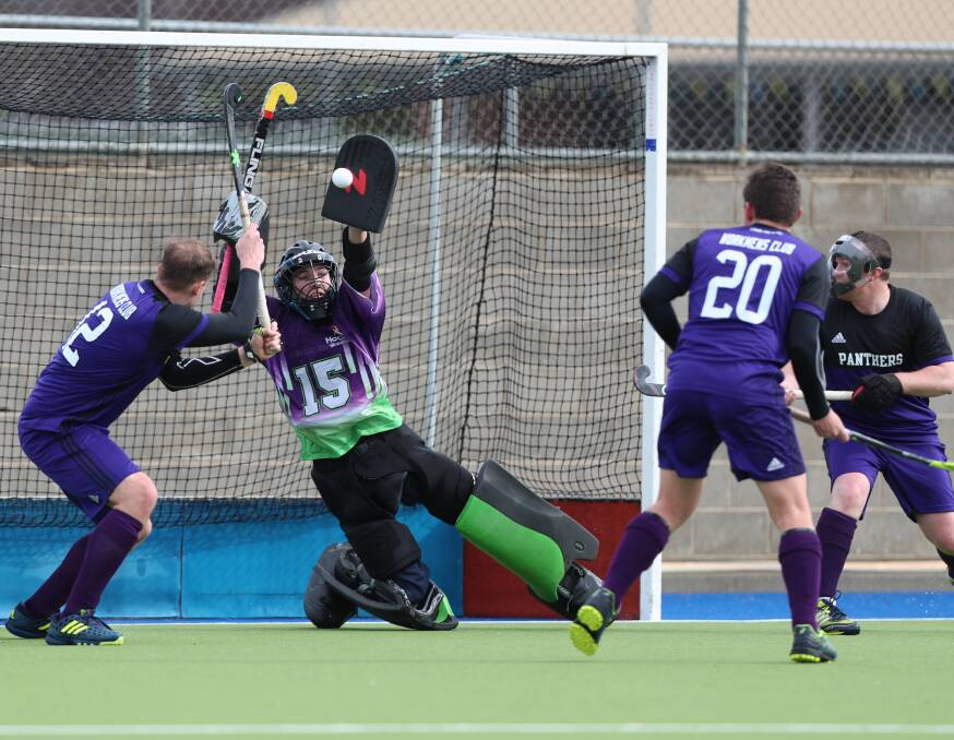 BRILLANT: Panthers goalkeeper Logan Hunter makes one of his many crucial saves. Photo: PHIL BLATCH