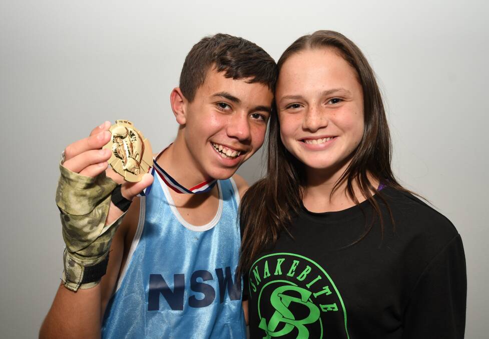 GOLDEN MOMENT: Bathurst's Tyson Keogh, pictured with fellow Snakebite Boxing Bathurst fighter Kate Fallon, won gold at the Australian Amateur Boxing League's National Novice Titles. Photo: CHRIS SEABROOK