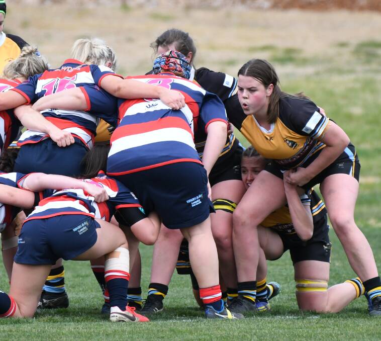 PACKING IN: Rachel Brown sets herself for a scrum against Mudgee in the preliminary final. Photo: CHRIS SEABROOK