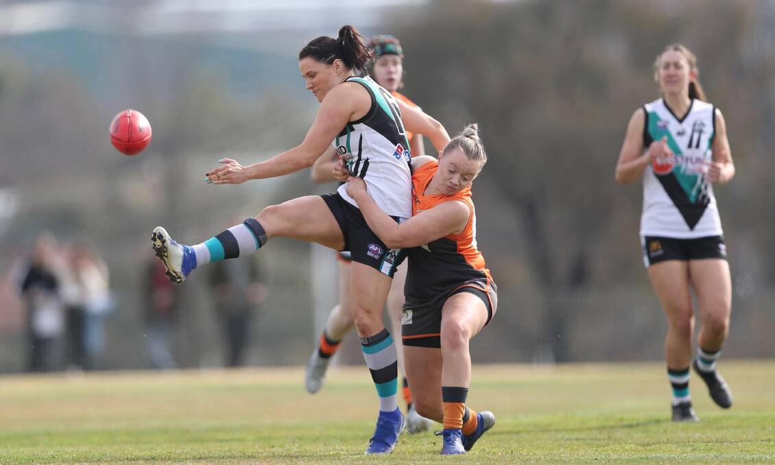 SINK THE BOOT IN: Angela Evans and her Lady Bushrangers team-mates are vying for a spot in the AFL Central West women's grand final. Photo: PHIL BLATCH