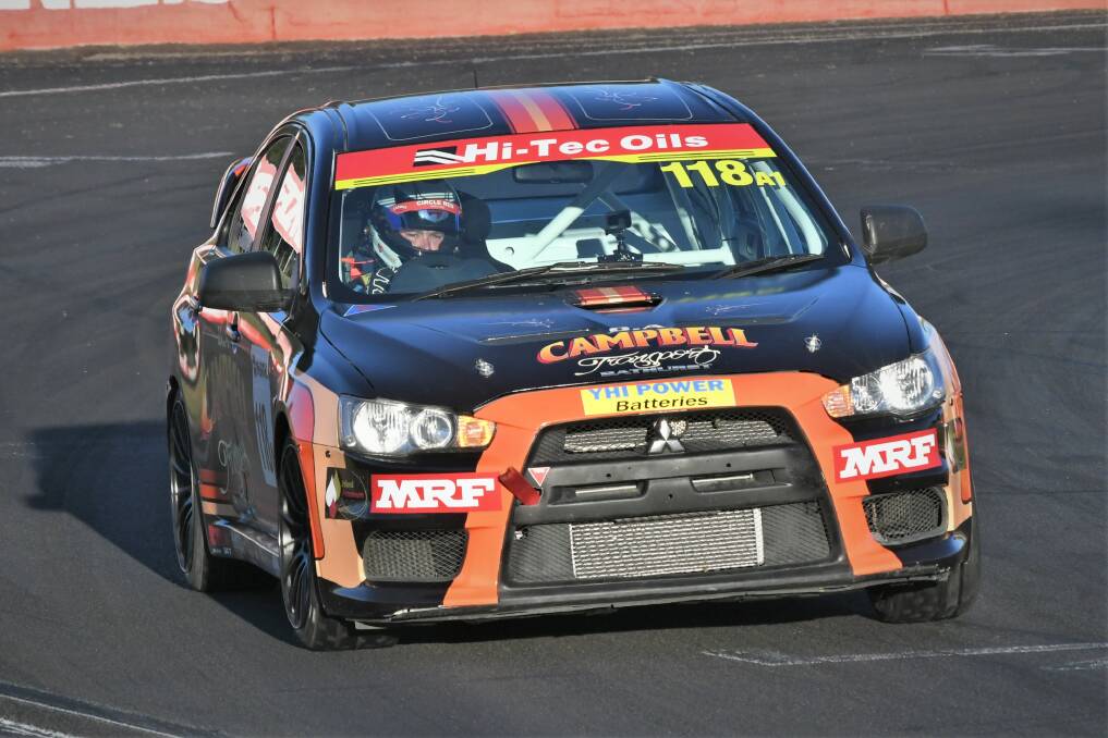 DISAPPOINTMENT: After at one stage running second outright, the Mitsubishi Lancer of Dean Campbell was a DNF in the Bathurst 6 Hour. Photo: CHRIS SEABROOK