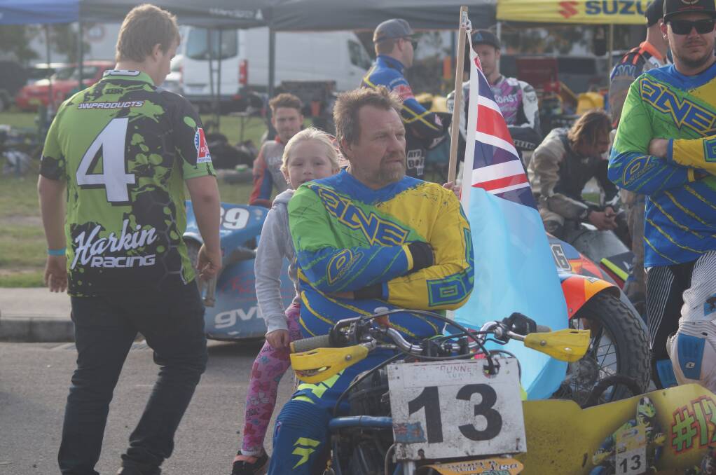 TAKING IT IN: Sean Griffiths checks out the Newcastle crowd before the parade lap. Photo: CONTRIBUTED