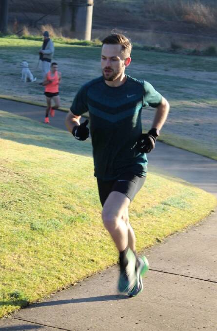COLD DAY, HOT TIME: Brandon Martin lowered his personal best time - and the Bathurst parkrun record - by two seconds. Photo: BATHURST PARKRUN
