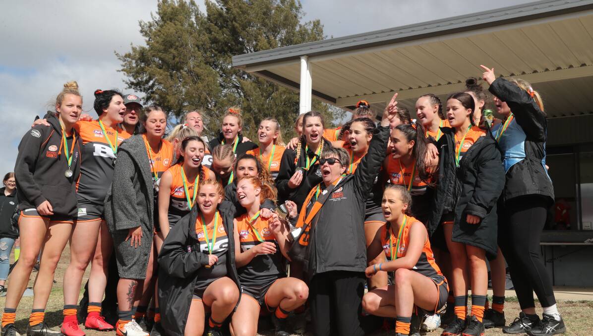 The Bathurst Giants held off the Bathurst Lady Bushrangers in Saturday's grand final to make it an undefeated premiership. Photos: PHIL BLATCH