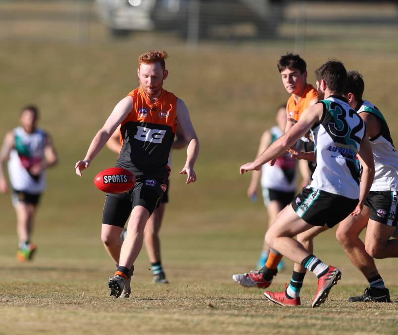 OVER THE LINE: Brody Field and his Giants team-mates held off a determined Parkes Panthers. The win assures them of a top three finish in the minor premiership.
Photo: PHIL BLATCH