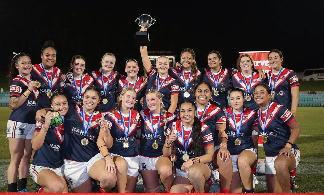 Bathurst's Paige Lowe, back, third from left, with her Roosters team-mates after winning the Tarsha Gale Cup grand final. Picture by Bryden Sharp Photography