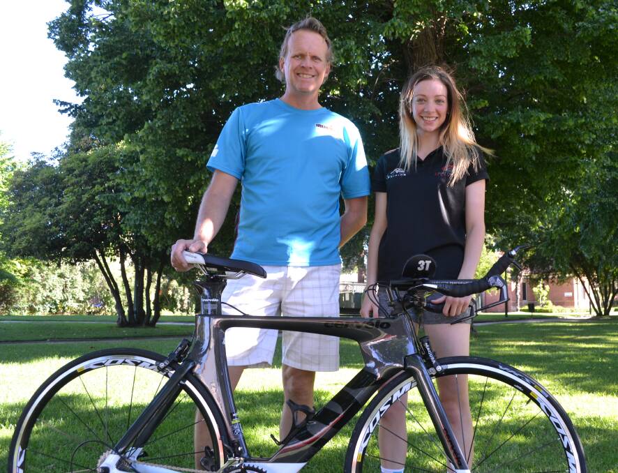 EXPERIENCED: Bathurst triathlete Keith Tuynman, pictured with daughter Brooke, will tackle his ninth Cairns Ironman on Sunday. He will be joined in the Queensland event by four fellow Bathurst Wallabies.