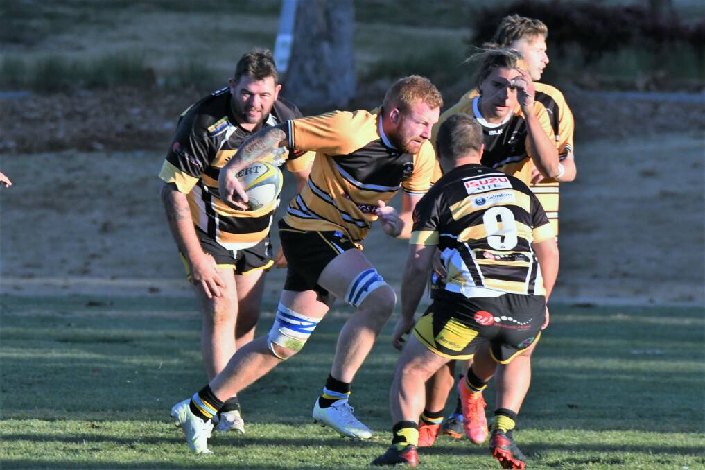 COMING THROUGH: Sam Chamberlain and his fellow students went on a scoring rampage against the Rhinos at University Oval. Photo: CHRIS SEABROOK
