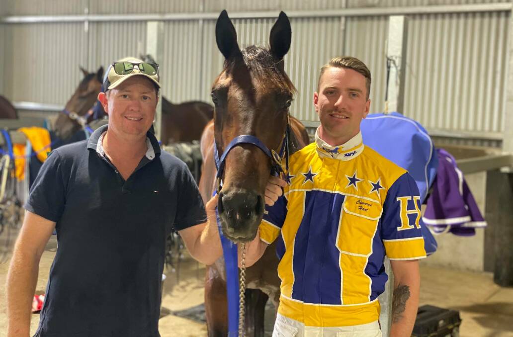 ULTIMATE DUO: Cameron Hart (right) will drive My Ultimate Skeeta and My Ultimate Billy at Bathurst on Wednesday night for trainer Jarrod Alchin (left). Photo: AMY REES