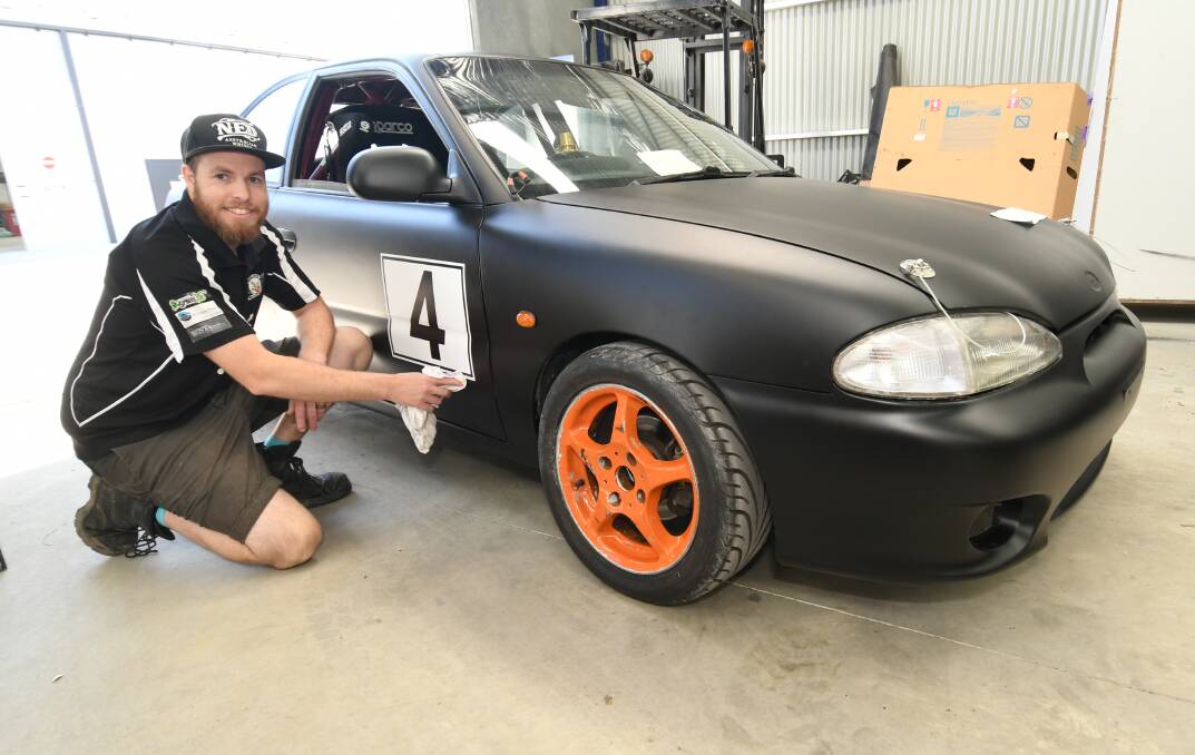 NEW WHEELS: Bathurst driver Matt Woodward was excited with the performance of his new Woodduck Motorsport Hyundai Excel at Wakefield Park last weekend. Photo: CHRIS SEABROOK