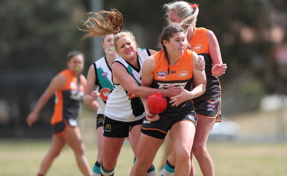 DEPARTING STAR: Matilda Flood's work in the ruck was a feature of the Giants' 2019 campaign, but she won't be back this season. Photo: PHIL BLATCH