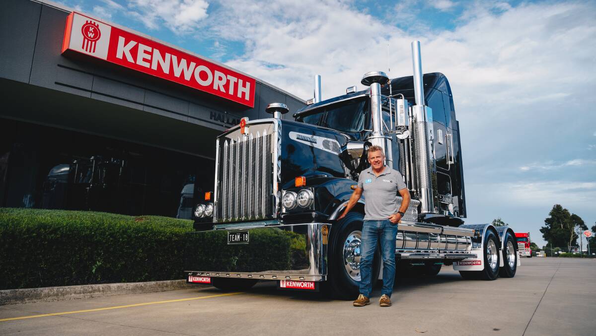 BATHURST BOUND: Team 18 boss Charlie Schwerkolt with the Kenworth which is transporting the team's two Holden Commodores to Mount Panorama for the Bathurst 500.