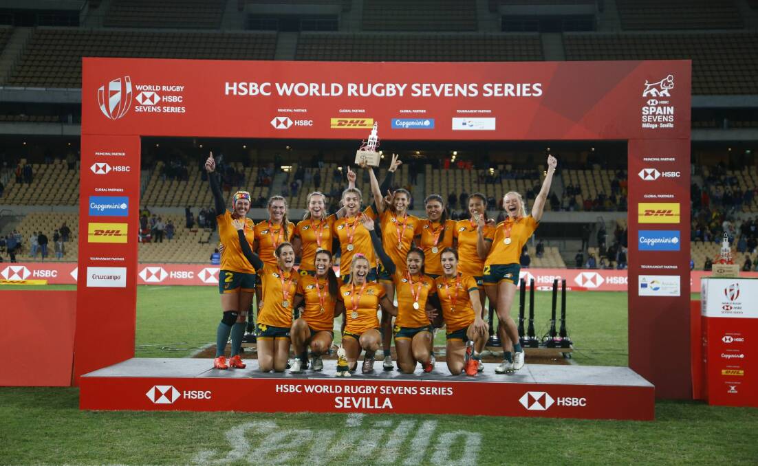 ANOTHER TRIUMPH: Jakiya Whitfeld (back, second from left) and her Australian team-mates celebrate after beating Ireland. Photo: MARTIN SERAS LIMA