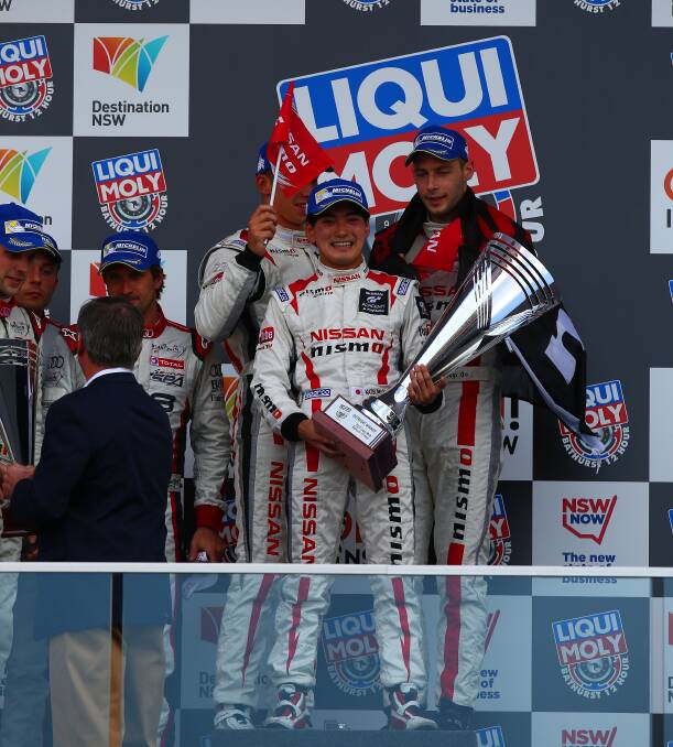 PROUD MOMENT: Katsumasa Chiyo holds the 2015 Bathurst 12 Hour trophy. He will contest the enduro again next year. Photo: NATHAN WONG