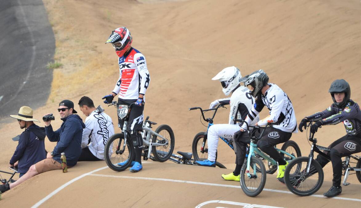 RECON: Australian coach Luke Madill (right) takes footage of riders during a camp in Bathurst ahead of the World Cup round.