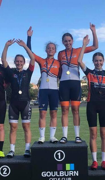 GOLDEN MOMENT: Bathurst Cycling Club junior and WRAS rider Kalinda Robinson (right) paired with Jade Perry to win madison gold. Photo: CONTRIBUTED