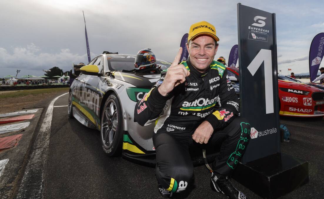 HANG UP THE HELMET: Craig Lowndes will retire from full-time driving at the end of the year. Photo: AAP
