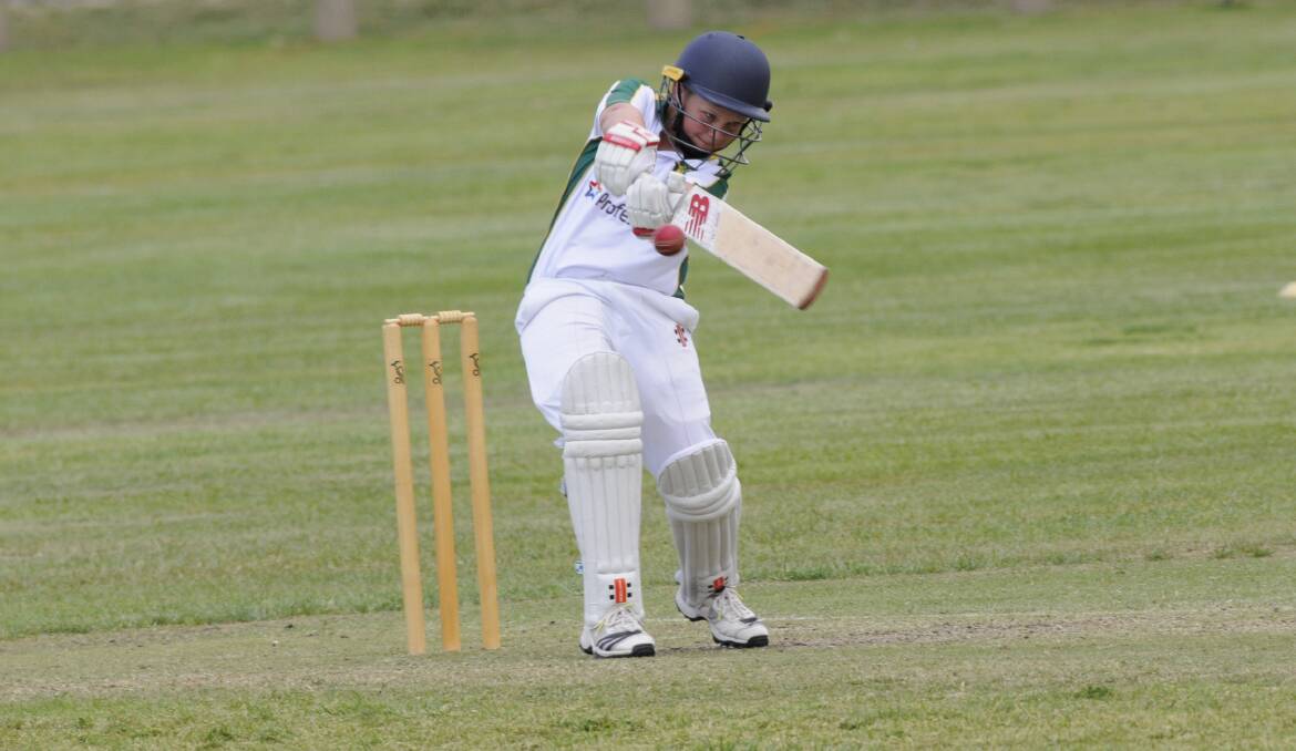 LINING IT UP: Bathurst under 12s player Ruben Newton is about to belt this Mudgee delivery. He impressed with the bat for his side with a well-made 22. Photo: CHRIS SEABROOK 110517cu12s1