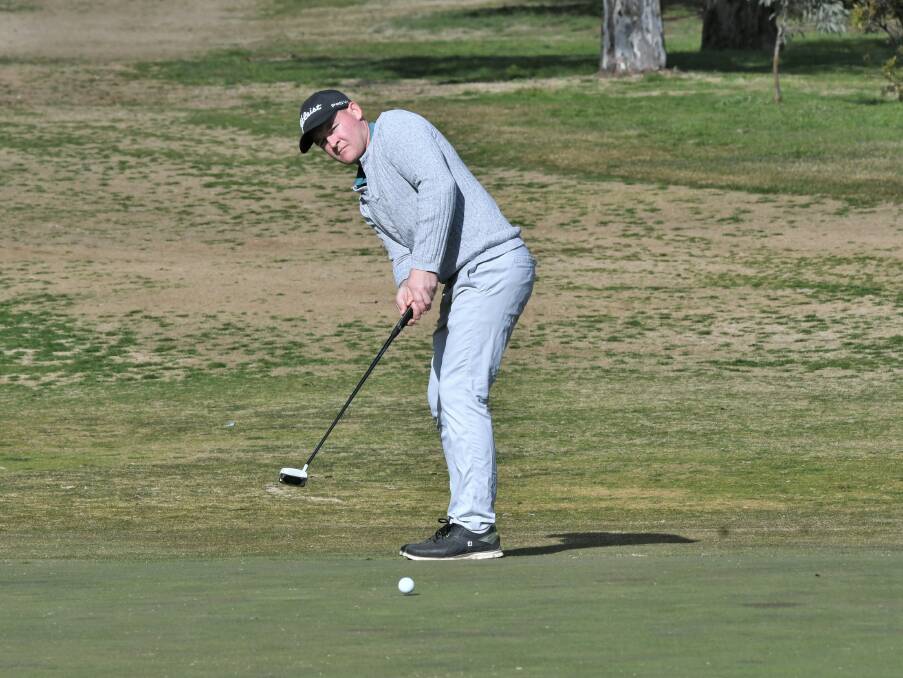 SUNDAY ROUND: Daniel Stibbard putts on the 18th hole during a recent round at Bathurst. Photo: CHRIS SEABROOK 071121cgolf1