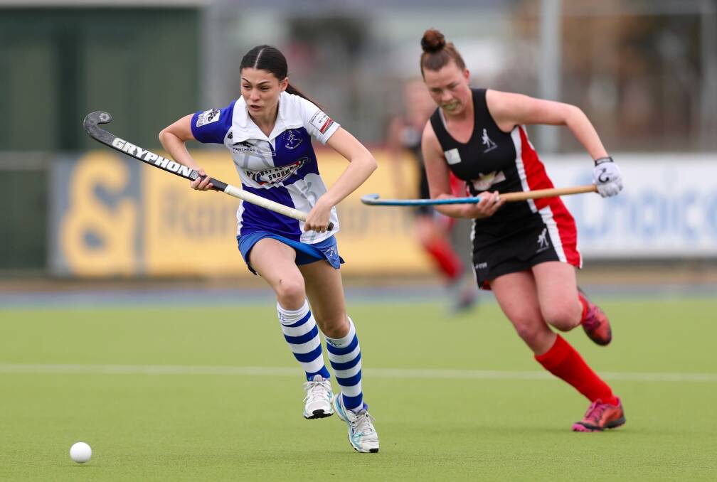 NO LONGER RIVALS: Millie Fulton's is chased by Parkes' Savannah Draper during a match in 2020, but this year both will wear Saints colours in the Central West Premier League competition. Photo: PHIL BLATCH