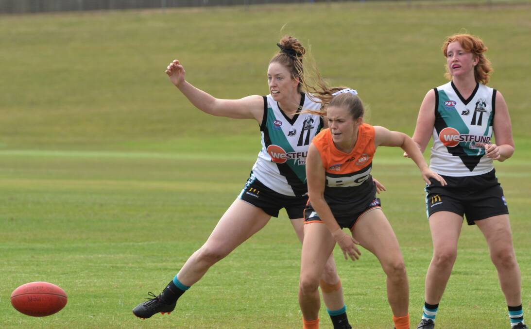 TRIAL TIME: Amelia Wright (left) returned for the Lady Bushrangers and newcomer Liz Ward (right) also tested herself against the Bathurst Giants.
