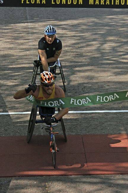 REPEAT?: Carcoar ace Kurt Fearnley, pictured winning in 2009, will be pushing for his third London Marathon victory this Sunday. It is the world's richest BMX race.