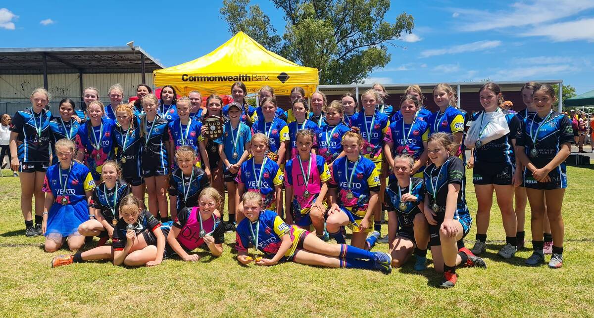 The Vipers and Platypi players show off their grand final medals. Picture by Western Women's Rugby League