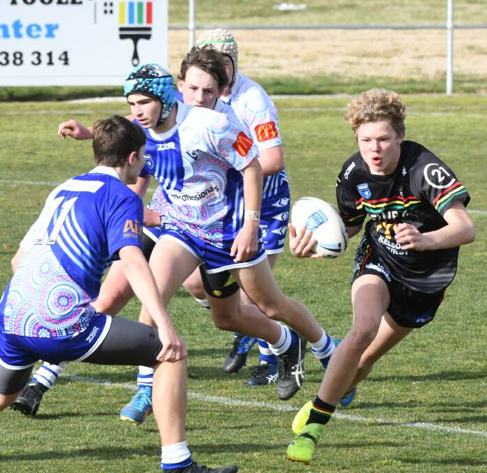 Bathurst Panthers got the better of St Pat's in Sunday's Group 10 Junior Rugby League under 16s season opener. Photos: CHRIS SEABROOK
