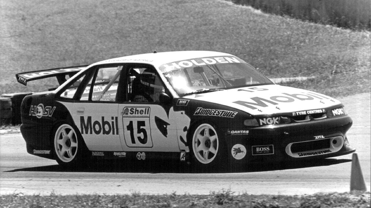 DEBUT: Craig Lowndes guides his Commodore around the Mount during the Bathurst 1000.