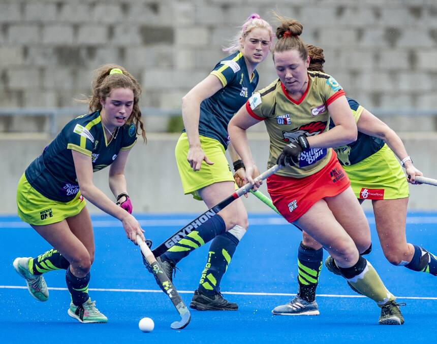 UNDER PRESSURE: Jess Watterson, pictured in action against Tassie, and her NSW Pride team-mates must win their two remaining round games to keep their Hockey One final hopes alive. Photo: GREG THOMPSON/CLICK INFOCUS