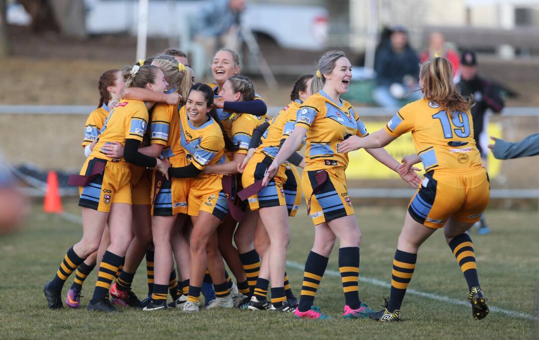 YOU BEAUTY: CSU Yellow players celebrate their New Era Cup grand final win over CSU Blue. Photo: PHIL BLATCH